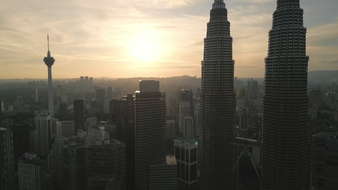 Aerial view of Kuala Lumpur city center, skyline at sunset near Petronas Towers