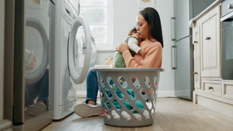 Woman,-baby-in-arms-with-laundry-and-basket