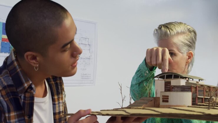 Woman and man working in a creative office