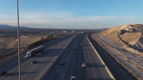 aerial shot over traffic on freeway interstate 15 in draper utah