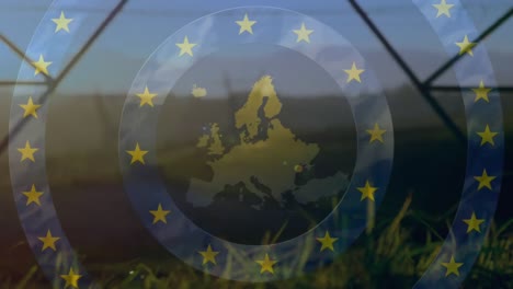 Animation-of-map-of-europe-with-stars-of-european-union-flag-over-electricity-pylons-in-field