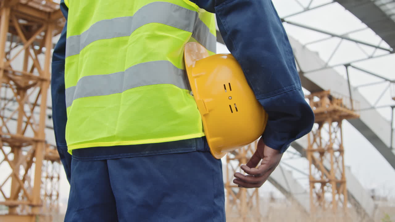 Mid-Section of Construction Worker Outside