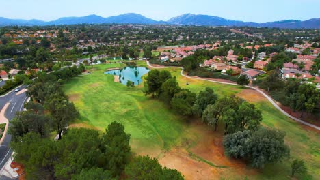 golf club with pond shot from above