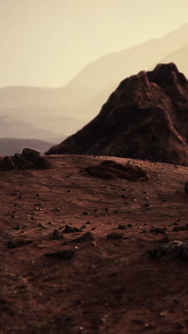 un paisaje marciano con rocas y colinas rojas