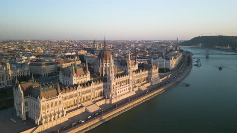 Aerial-Boom-Shot-Reveals-Budapest,-Hungarian-Parliament-in-Foreground