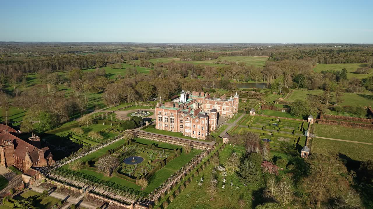 Aerial view across vast Hartfield house majestic Elizabethan manor gardens and country house estate
