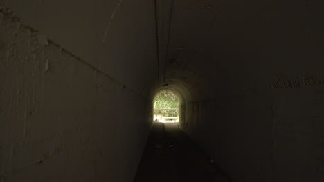 walking down the tunnel under the beach of cala de mijas and out into the sunshine