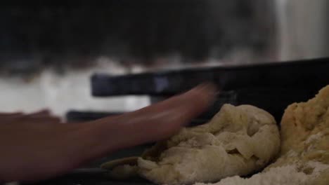 a woman prepares bread and cookies