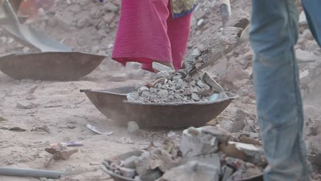 workers demolishing building