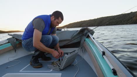 man preparing bait for fishing 4k