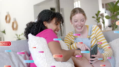 Animation of social media text and icons over diverse girlfriends using smartphone