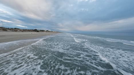 The-french-coastline-during-cloudy-day-with-fast-FPV-aerial-shot