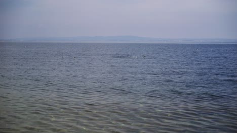 Small-waves-on-the-pebble-beach