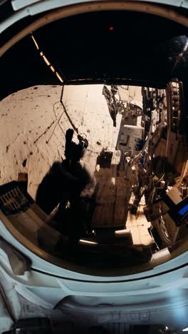 astronaut exploring lunar surface with lunar module in background