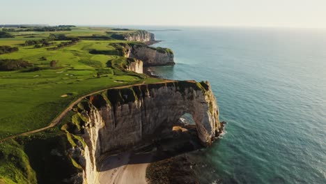 coastal cliffs of etretat, france with golf course