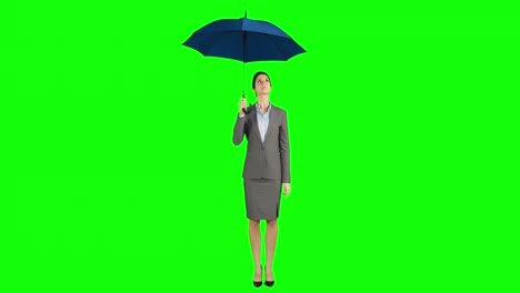 businesswoman standing under umbrella