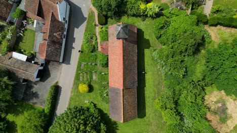 a bird's-eye-view push-in shot of st mary's church in stodmarsh