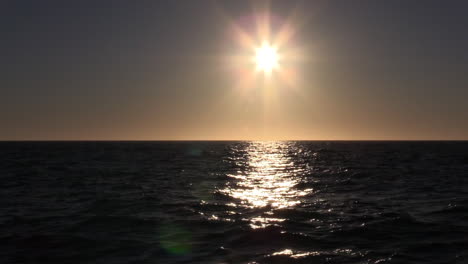 Sun-setting-with-rays-glittering-on-the-sea