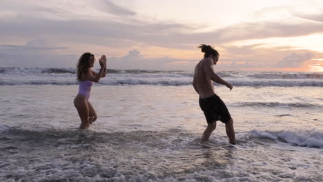 couple playing with water