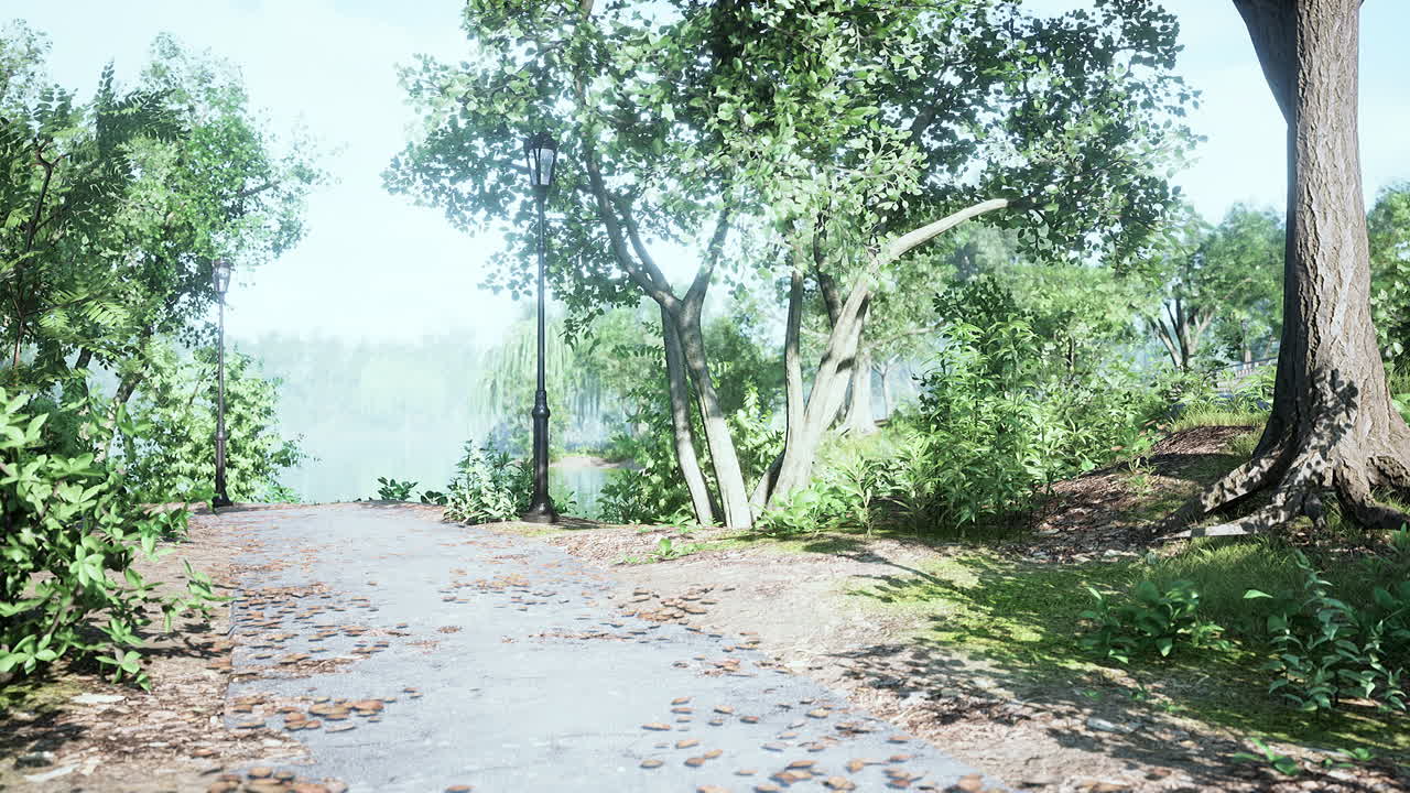 푸른 공원을 가로질러 조용한 호수로 가는 그림 같은 길