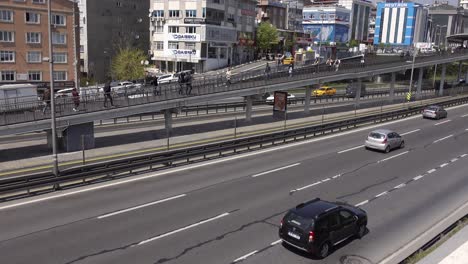city street with overpass and traffic