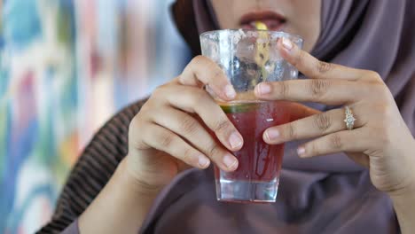 woman drinking juice