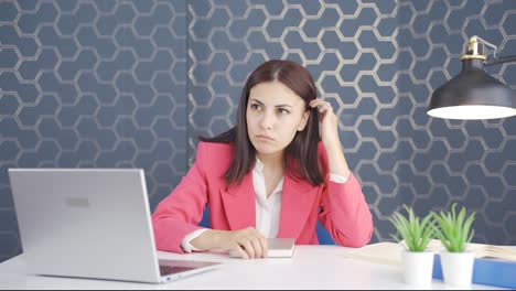 Thoughtful-young-business-woman.