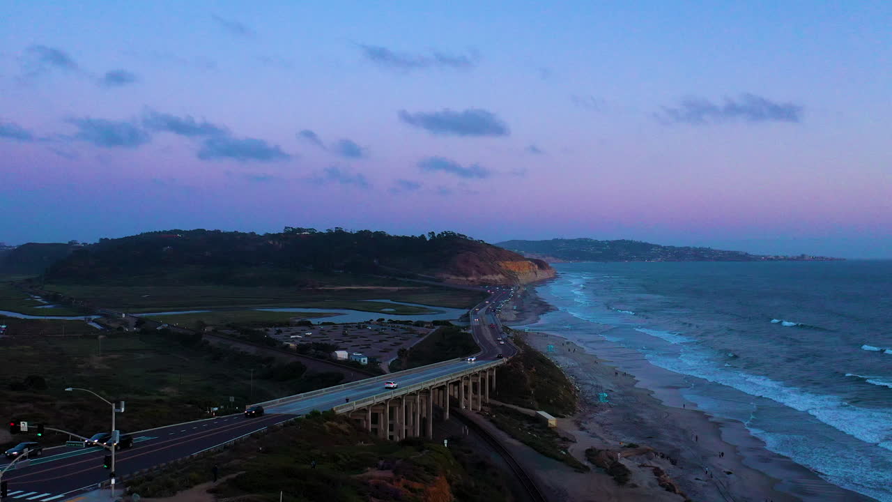 After sunset aerial view of bluffs in Del Mar looking towards Torrey Pines and La Jolla