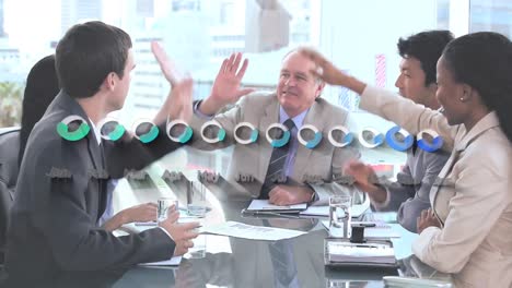 statistical data processing over diverse businesspeople high fiving each other at office