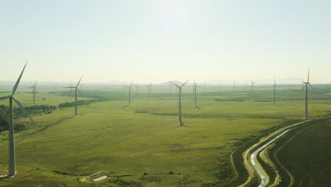 wind turbines out on an open field