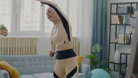 Senior Woman Stretching at Home