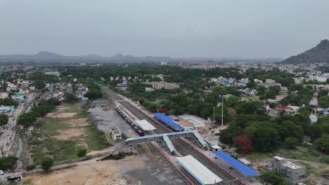 aerial drone shot of railway track in middle of vellore city
