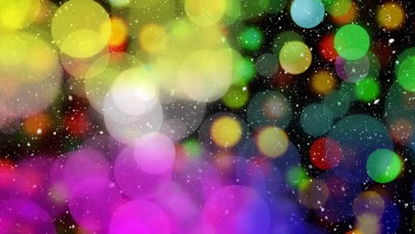 Animation-of-snow-falling-over-colourful-defocussed-christmas-lights