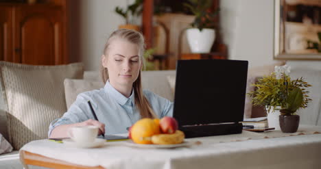 Architect-Working-On-Laptop-At-Home