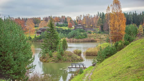 Wind-Blowing-With-Countryside-Nature-During-Autumn-Season-With-Cabins-Near-The-Lake