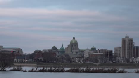 harrisburg, pennsylvania - january 7, 2021: a view of the harrisburg state capital across the susquehanna river