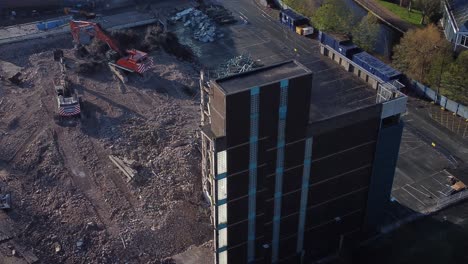 demolished multi storey car park concrete construction site debris in town regeneration aerial view demolition