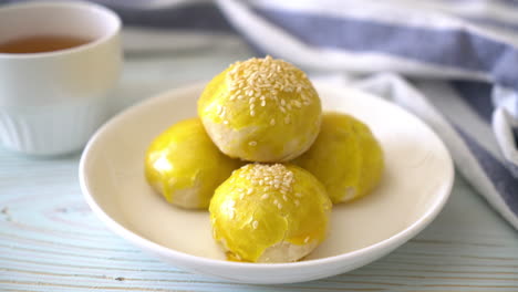 chinese pastry or moon cake filled with mung bean paste and salted egg yolk