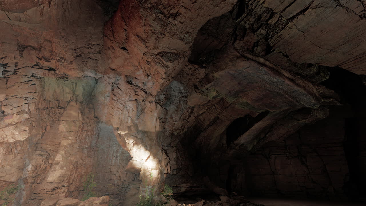 luz brillando en la entrada de una cueva oscura