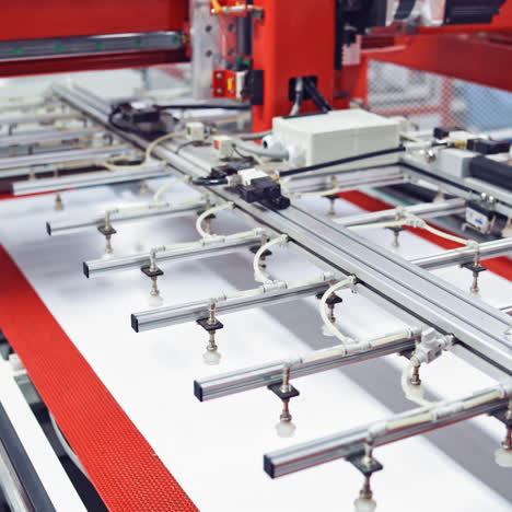 modern manufacturing equipment inside the plant. automated technologies in the factory indoors. camera moves slowly.