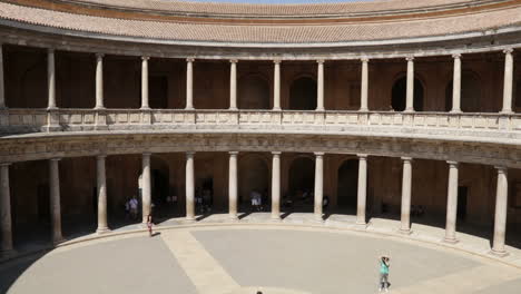 courtyard with columns and people