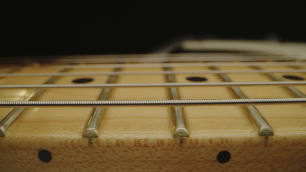 Close-up of a Guitar Fretboard