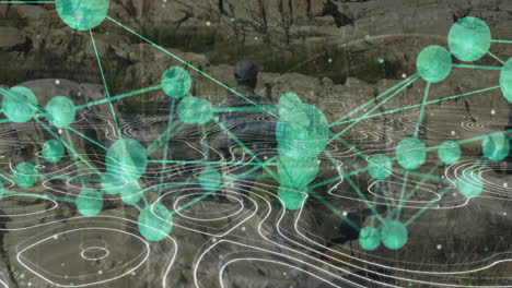 man wearing cap and backpack sitting on hill, viewing technology network nodes with contour lines