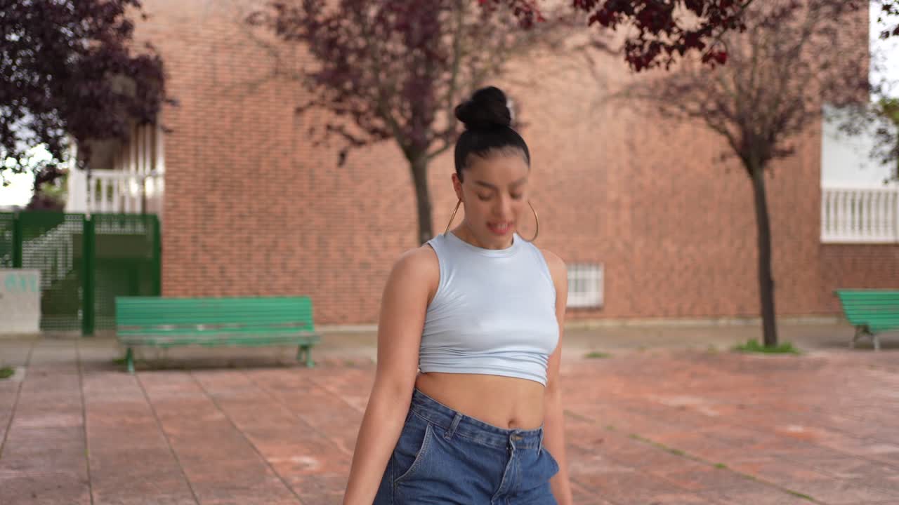 Woman dancing in an urban environment