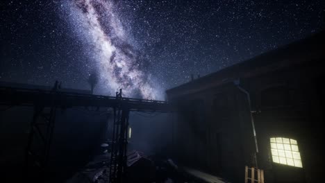 milky way stars above abandoned old fatory