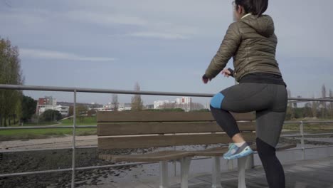 rear view of confident sportswoman training outdoor