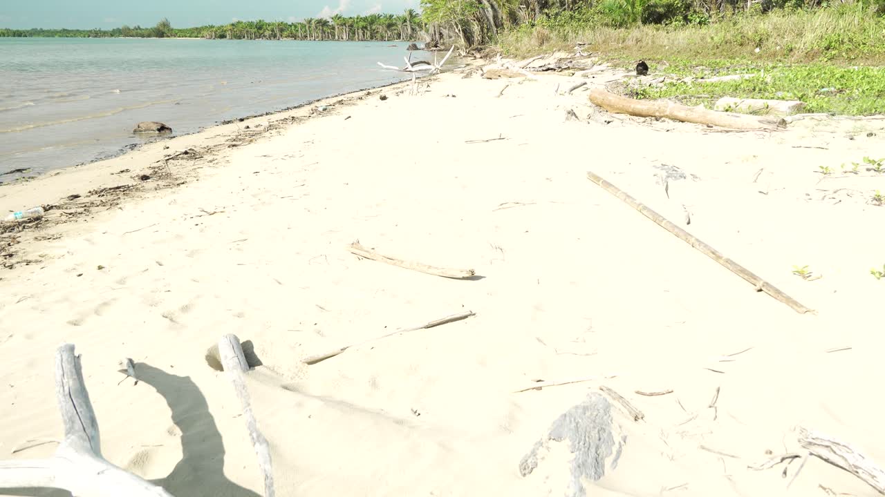 Summer View Of Alit Beach And Fishing Village Kabong,White Sandy Beach,Blue Sea ,Sky And Green Coconut Trees,Sarawak,Borneo.