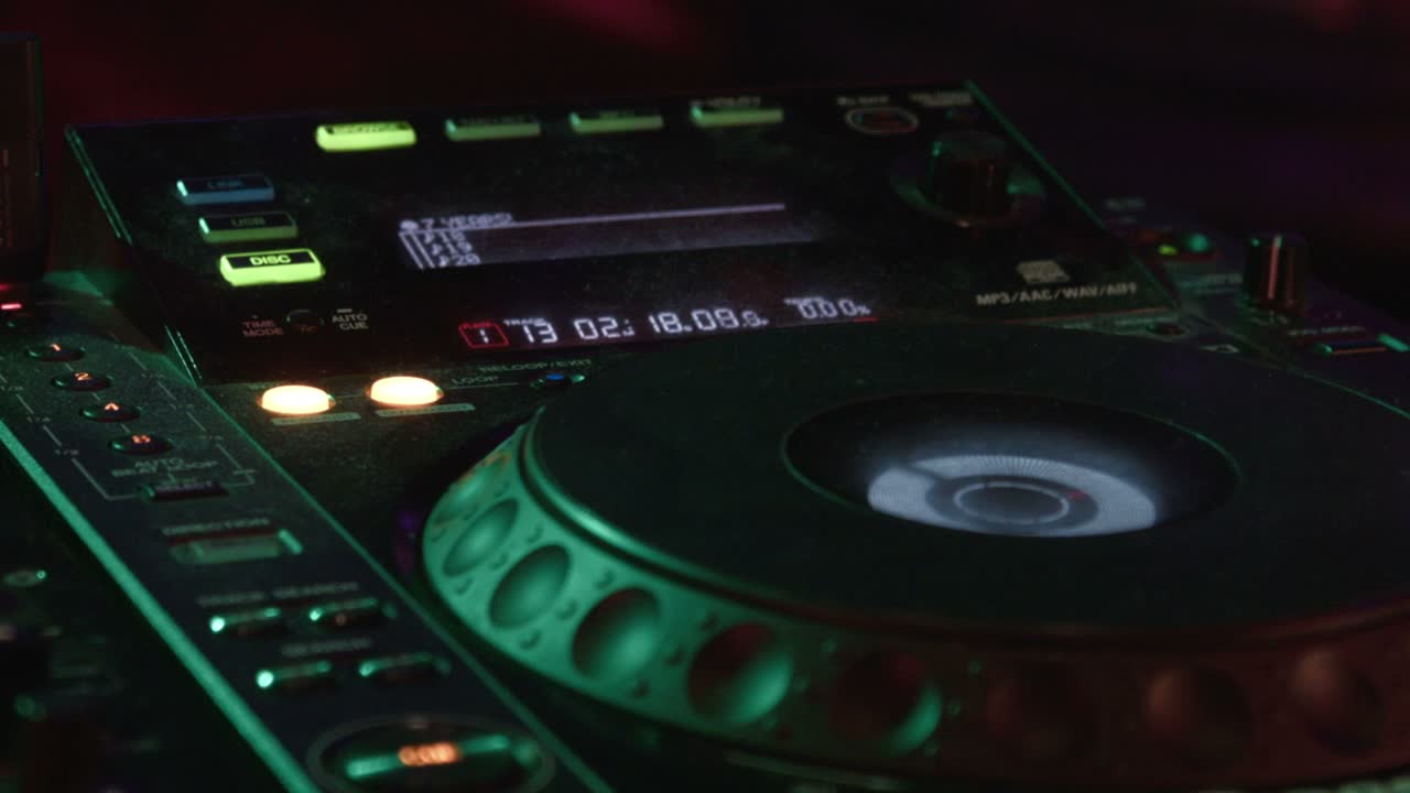 DJ Mixer in Night Club