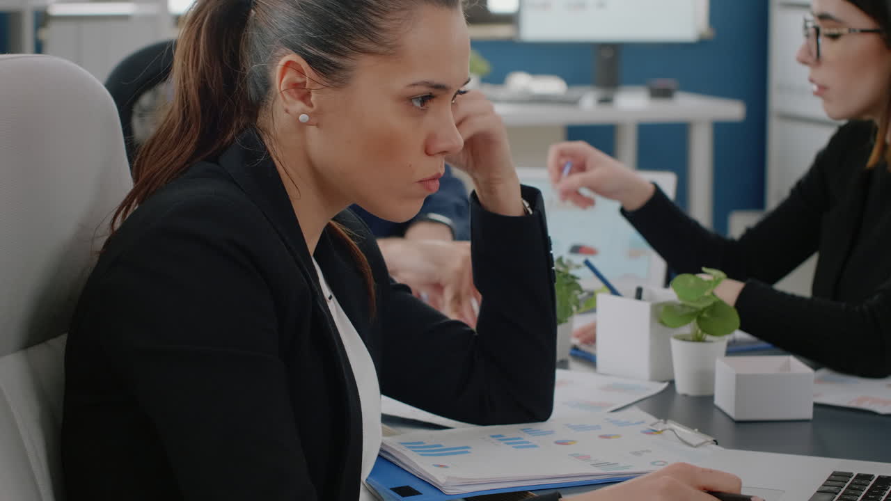 Close up of businesswoman using modern laptop for project