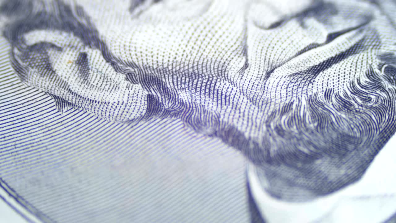 Volto di Abraham Lincoln in rotazione lenta su una banconota da cinque dollari